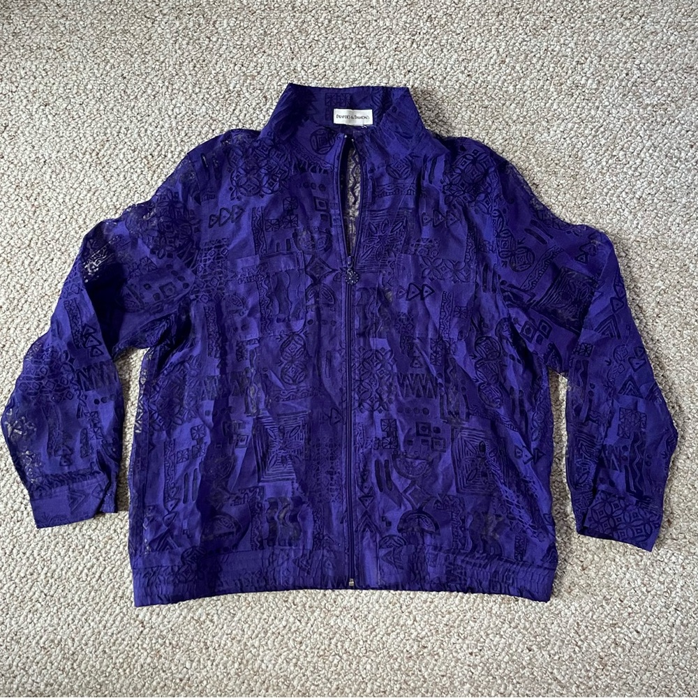 1980s style purple and jacket with a zipper in the front